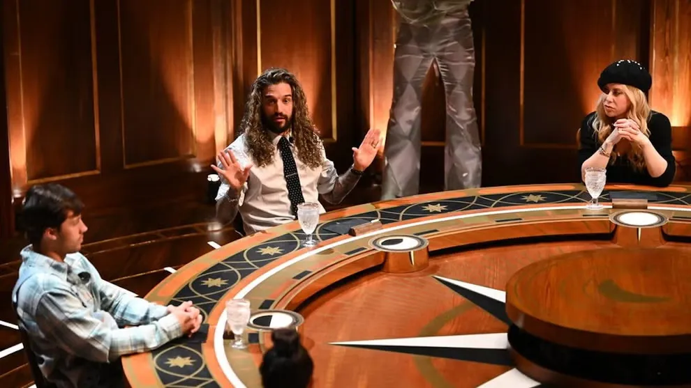 Players argue across the Round Table during a banishment vote